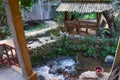 Wood house in the forest and rivulet 1