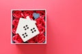 Wood house model with love you tag and red roses on red background with copy space for adding or mock up Royalty Free Stock Photo