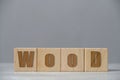 Wood inscription on wooden cubes.Environmentally friendly material.