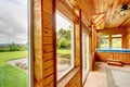 Wood interior of luxury spa room with jacuzzi tub and stone tile floor. Royalty Free Stock Photo