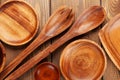 Wood kitchen utensils over wooden table Royalty Free Stock Photo