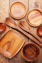 Wood kitchen utensils over wooden table Royalty Free Stock Photo