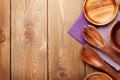 Wood kitchen utensils over wooden table background Royalty Free Stock Photo