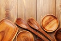 Wood kitchen utensils over wooden table Royalty Free Stock Photo