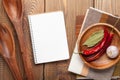 Wood kitchen utensils over wooden table Royalty Free Stock Photo