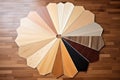 Wood laminate floor samples. Assortment of parquet or laminate vinyl floor samples in natural colors