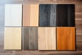 Wood laminate floor samples, vinyl tile. Assortment of parquet or laminate floor samples in natural colors