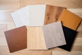 Wood laminate floor samples, vinyl tile. Assortment of parquet or laminate floor samples in natural colors