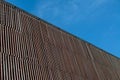 Wood lath wall  with blue sky Royalty Free Stock Photo