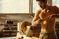 Wood lathe. Carpenter lathing wood Royalty Free Stock Photo