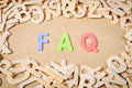 Wood letters as FAQ abbreviation.