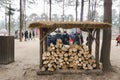 Wood logs in shelter ready for flaming to keep people warm in winter