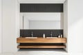 Wood look shelf vanity in modern bathroom Royalty Free Stock Photo