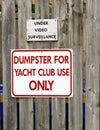 Yacht Club and Metal Signs Wooden Fence