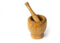 Wood mortar with pestle on the white background. Royalty Free Stock Photo