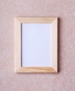 Wood narrow photo frame with mock up space on wall. Royalty Free Stock Photo