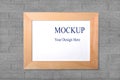 Wood narrow photo frame with mock up space on wall. Royalty Free Stock Photo