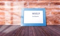 Wood narrow photo frame with mock up space on wall. Royalty Free Stock Photo