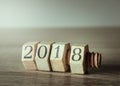 Wood nut and bolt on wood table with 2018 New Year Number. Royalty Free Stock Photo