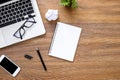 Wood office desk table with blank notebook, computer gadgets and supplies. Top view with copy space, flat lay Royalty Free Stock Photo