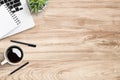 Wood office desk table with laptop, cup of coffee and supplies. Top view with copy space, flat lay Royalty Free Stock Photo