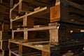 Wood pallets used for transport of goods. Stacked.
