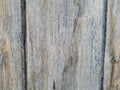 Wood panel with vertical lines, centered panel, weathered natural discoloration