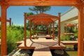 Wood pavilion, deck and plants in summer resort Royalty Free Stock Photo