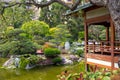 Wood pavilion overlooking a pond of the Japanese garden of Monaco Royalty Free Stock Photo