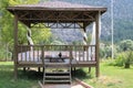 Wood pavillon. Wood pergola and forest. Royalty Free Stock Photo