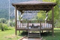 Wood pavillon. Wood pergola and forest. Royalty Free Stock Photo
