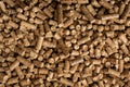 Wood pellet background. Close up natural wood pellet. Ecological heating, renewable energies Biofuels. Top view. Flat Royalty Free Stock Photo