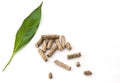 Wood pellet with leaf Royalty Free Stock Photo