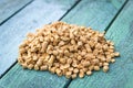 Wood pellets in the background. Biofuels. Wooden granules. Royalty Free Stock Photo