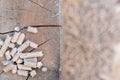 Wood pellets on a log of wood with a blurred background Royalty Free Stock Photo