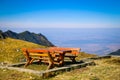 Wood picnic table and benches on top of the mountain Royalty Free Stock Photo