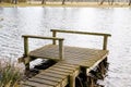 Wood pier pontoon in water lake in hourtin port France