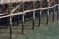 Wood pilings and structure under an ocean pier, Santa Monica CA