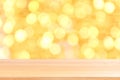 Wood plank on bokeh golden yellow colorful background, empty wood table floors on bokeh glitter light gold luxury Royalty Free Stock Photo