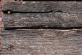 Close up on wood plank, cracked and nails rusted Royalty Free Stock Photo