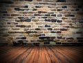 Wood planks floor on cracked indoor backdrop