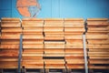 wood planks stacked high at a lumberyard