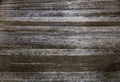 Wood planks texture dark background or wallpaper. overlap wooden wall horizontally have damage of old. Dark brown rustic aged barn Royalty Free Stock Photo