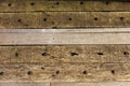 Wood planks texture dark background or wallpaper. overlap wooden wall horizontally have damage of old. Dark brown rustic aged barn Royalty Free Stock Photo