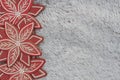 Wood poinsettias on gray plush material holiday background