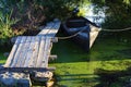 Wood pontoon and traditional boat