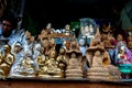 Wood products carved in the form of Buddha and deities Royalty Free Stock Photo