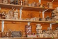 Wood products on shelf of souvenir shop. Handicraft of making wood
