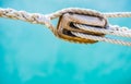 Wood pulley with nautical ropes of traditional sailing boat Royalty Free Stock Photo