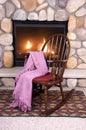 Wood Rocking Chair in Front of Home Fireplace